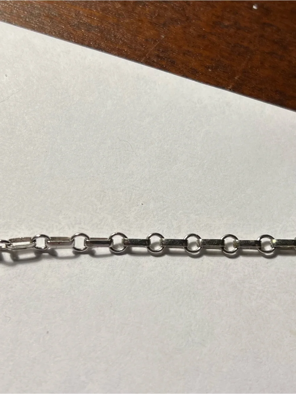 Sterling Silver charm bracelet with silver baby shoes charms